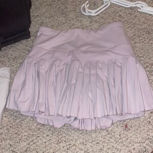 gold hinge tennis skirt